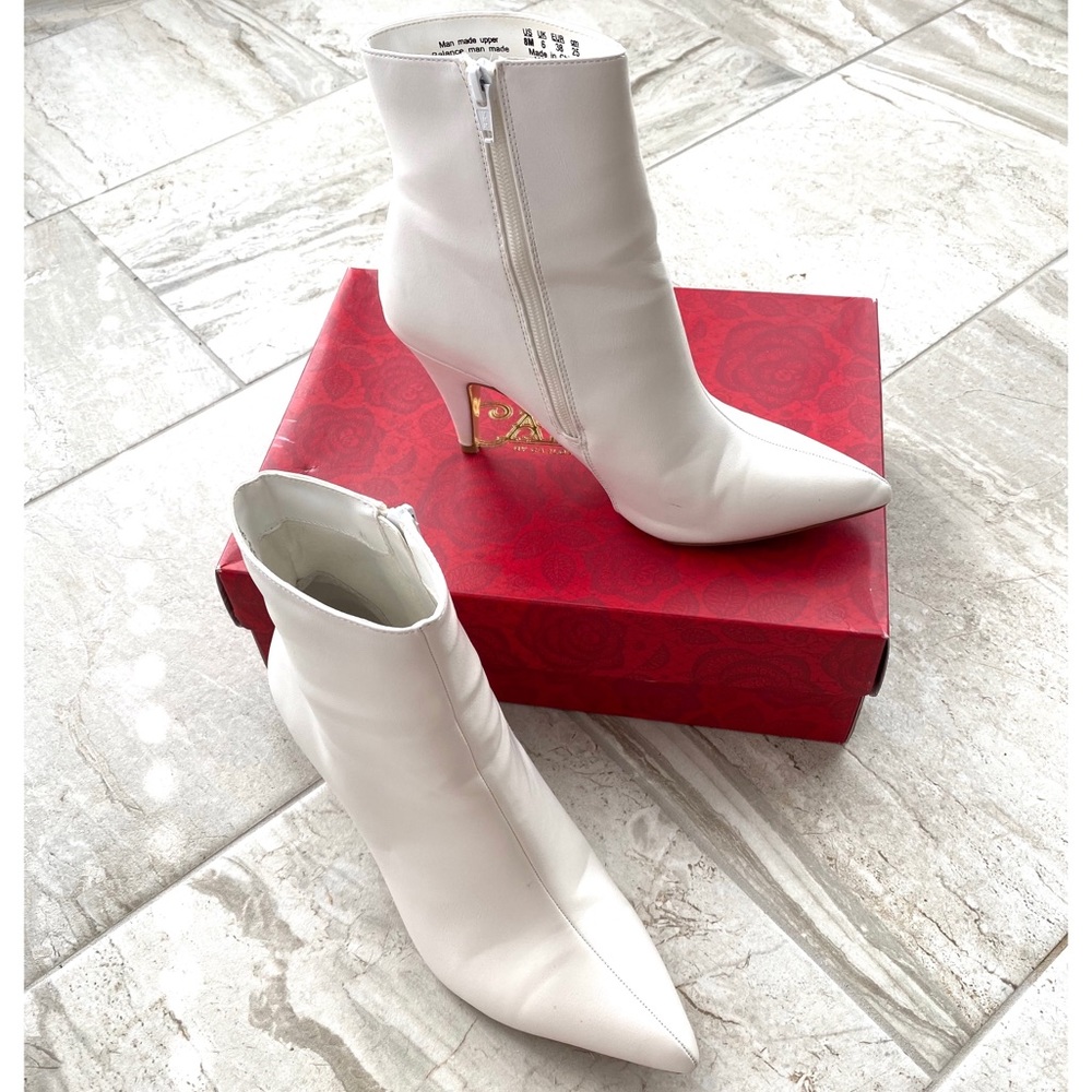 CARLOS by Carlos Santana white leather booties